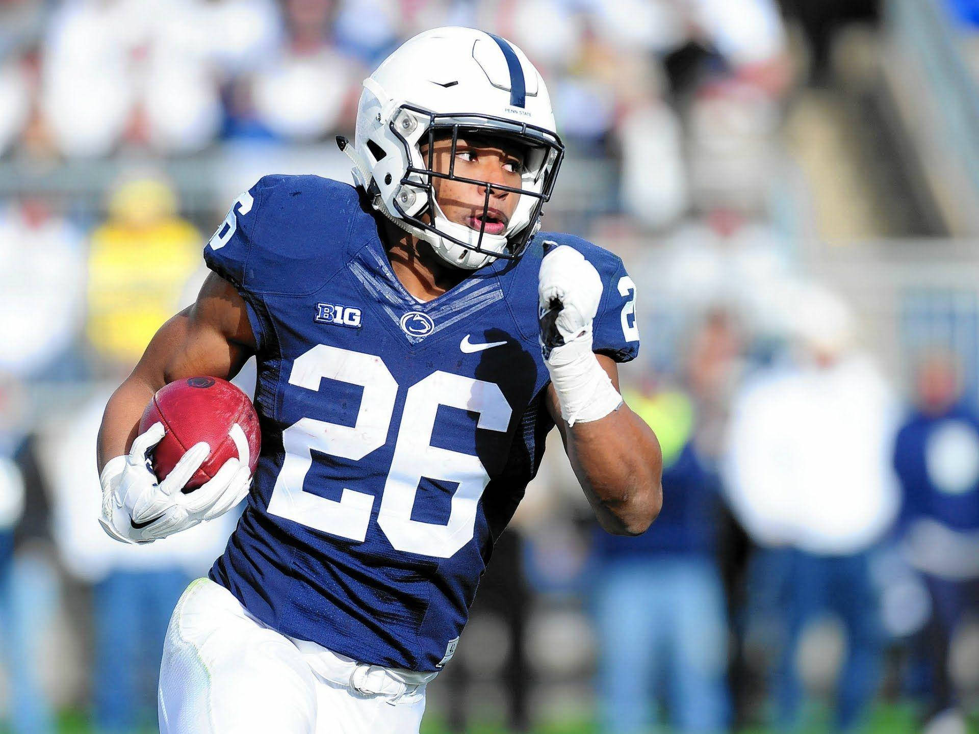 Penn State Football Player Running With The Ball