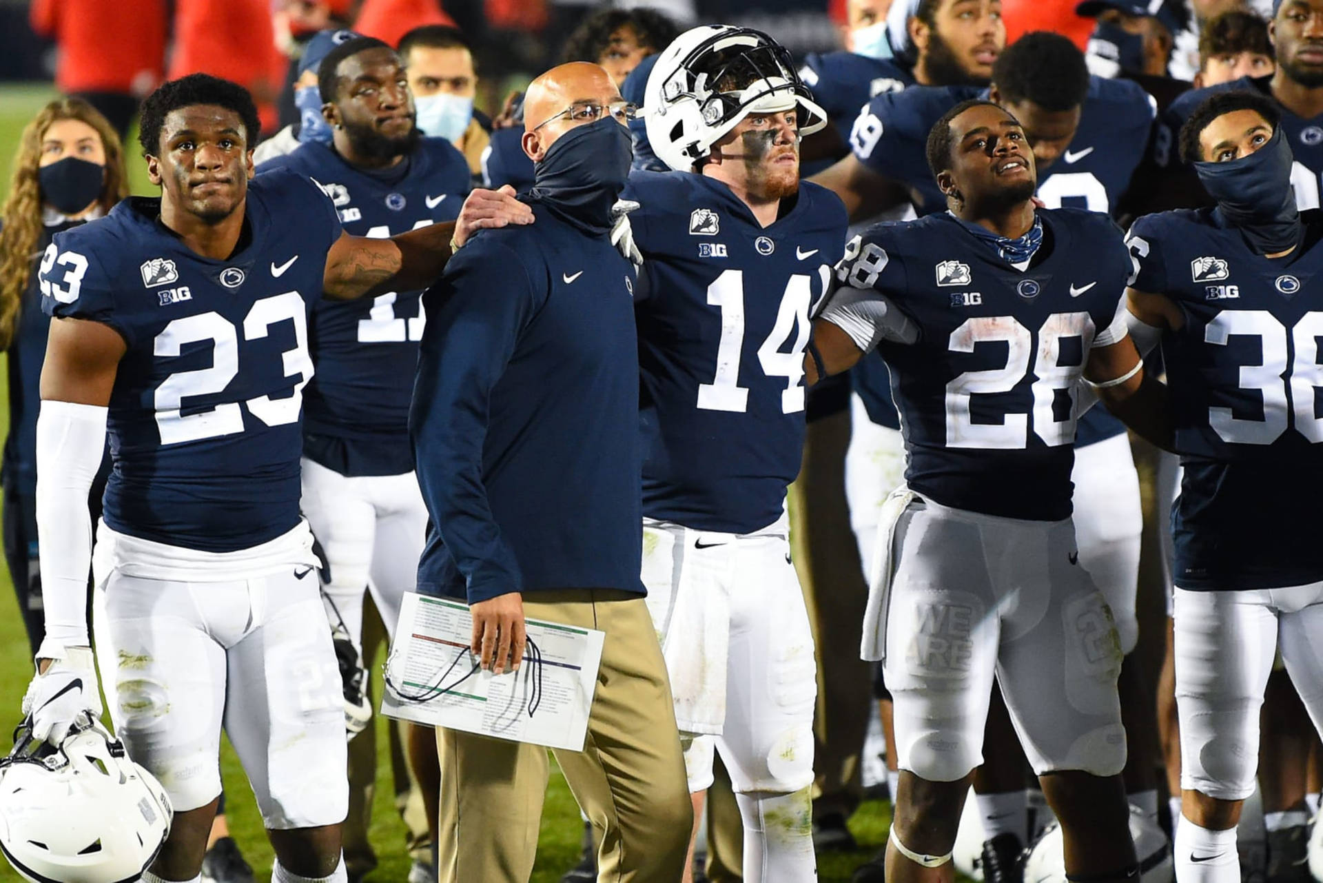 Penn State Football Players Standing On The Field