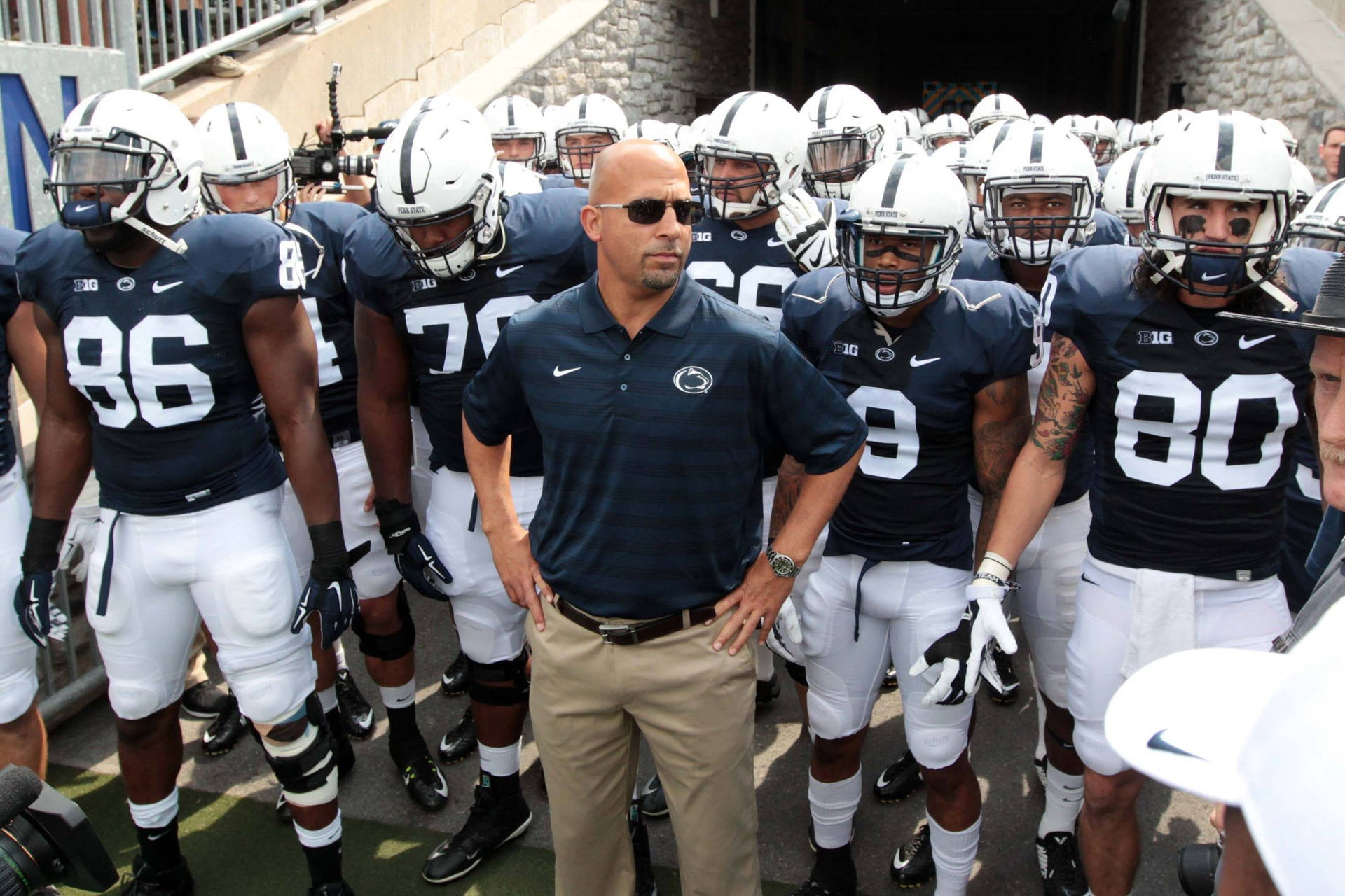 Pennsylvania State University Football Players And Coach Background