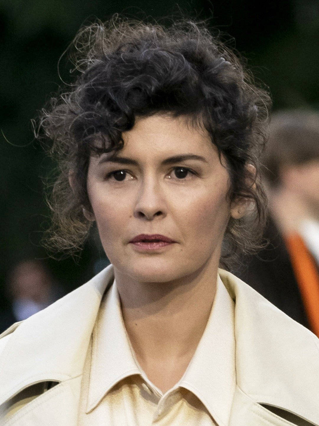 Pensive Audrey Tautou With Curly Hair - Actress In Reflection Background