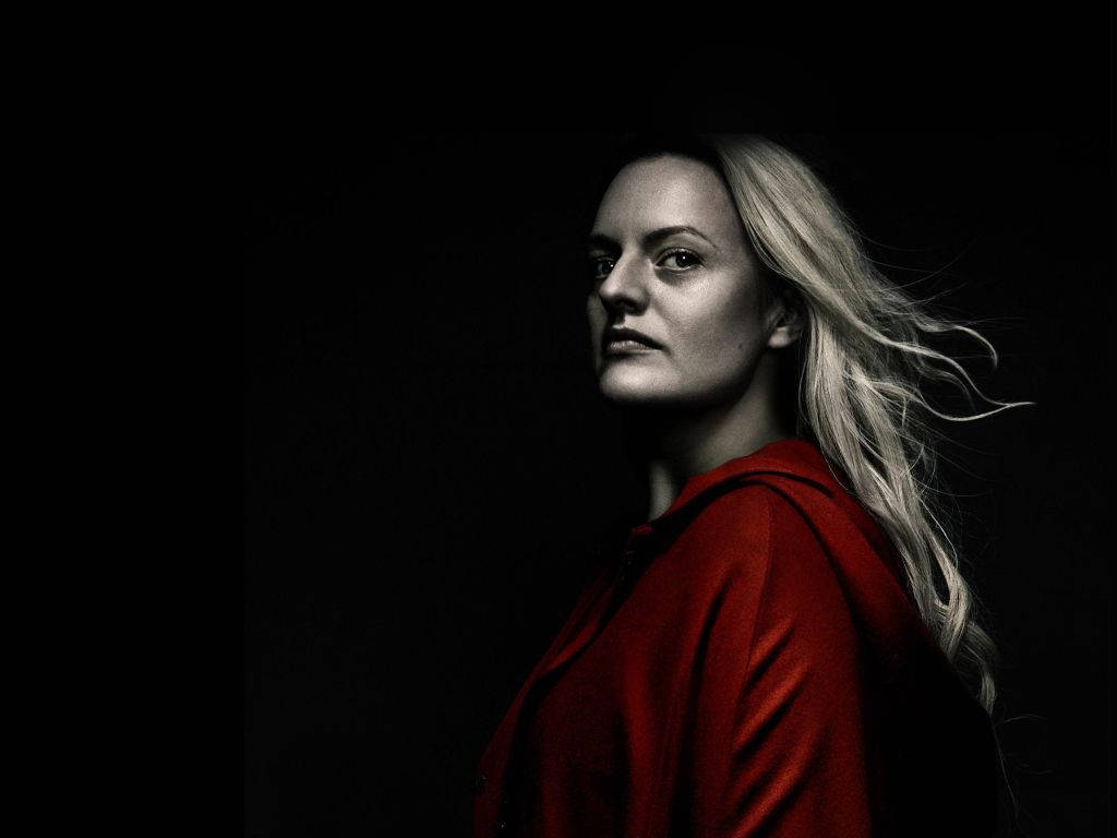 Pensive Elizabeth Moss In The Handmaid's Tale