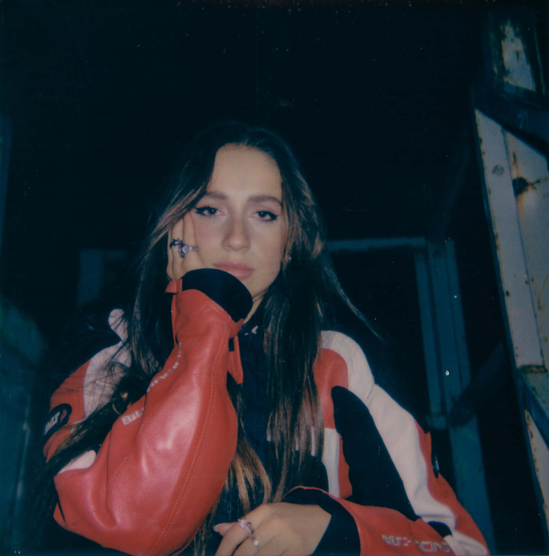 Pensive Young Womanin Red Jacket Background