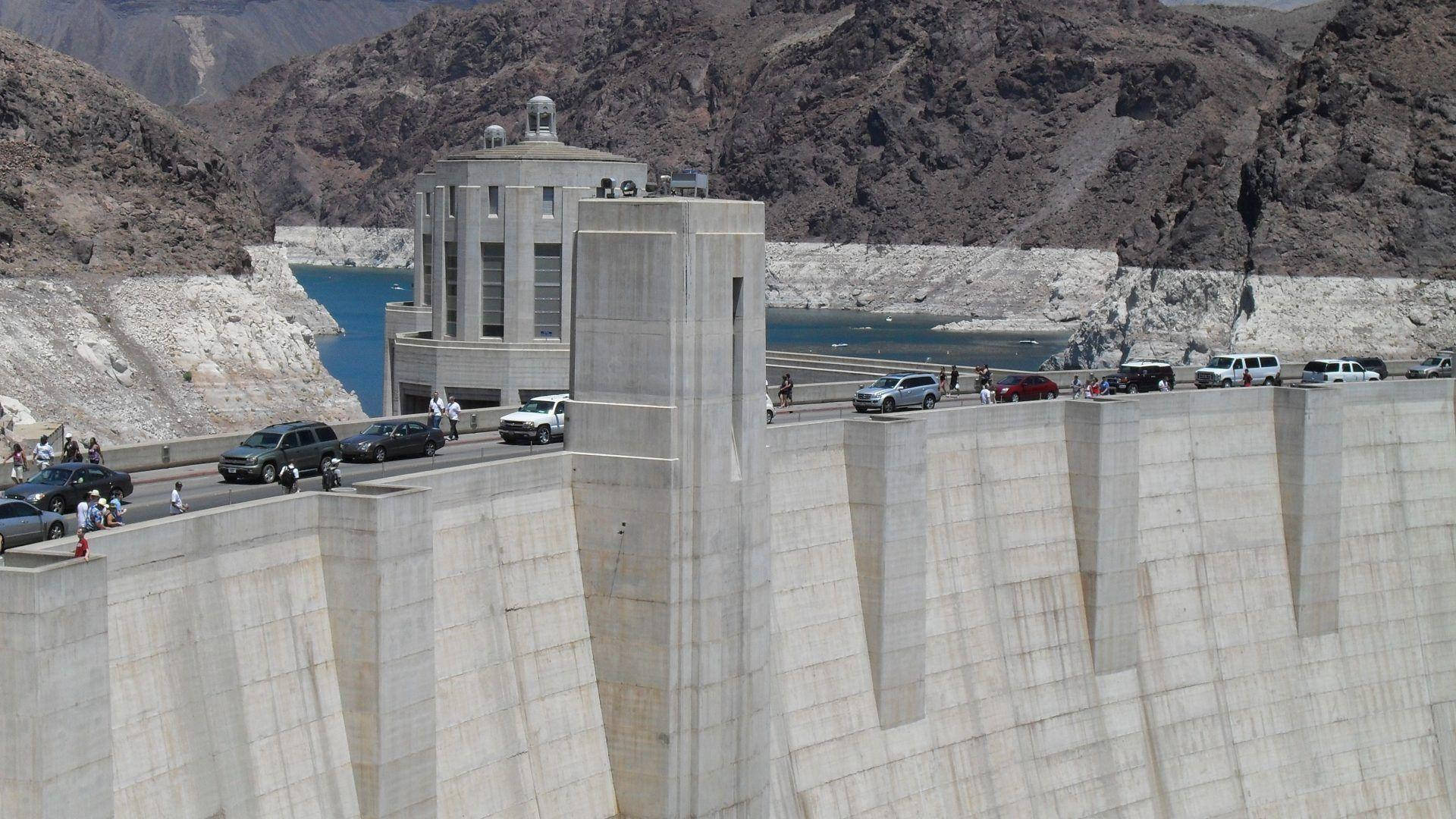 People And Cars On Hoover Dam Background