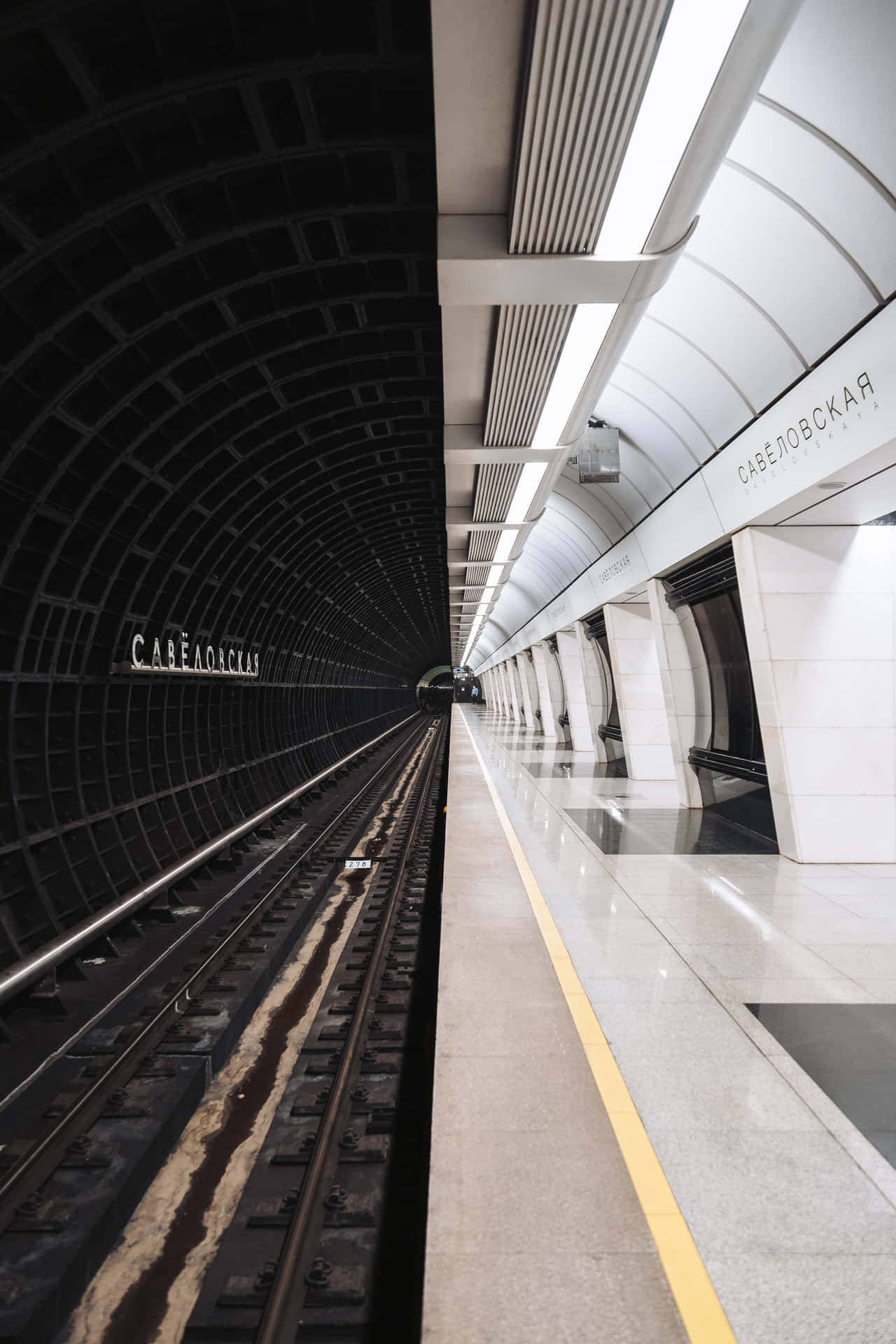 People Commuting On The Metro In A City Background