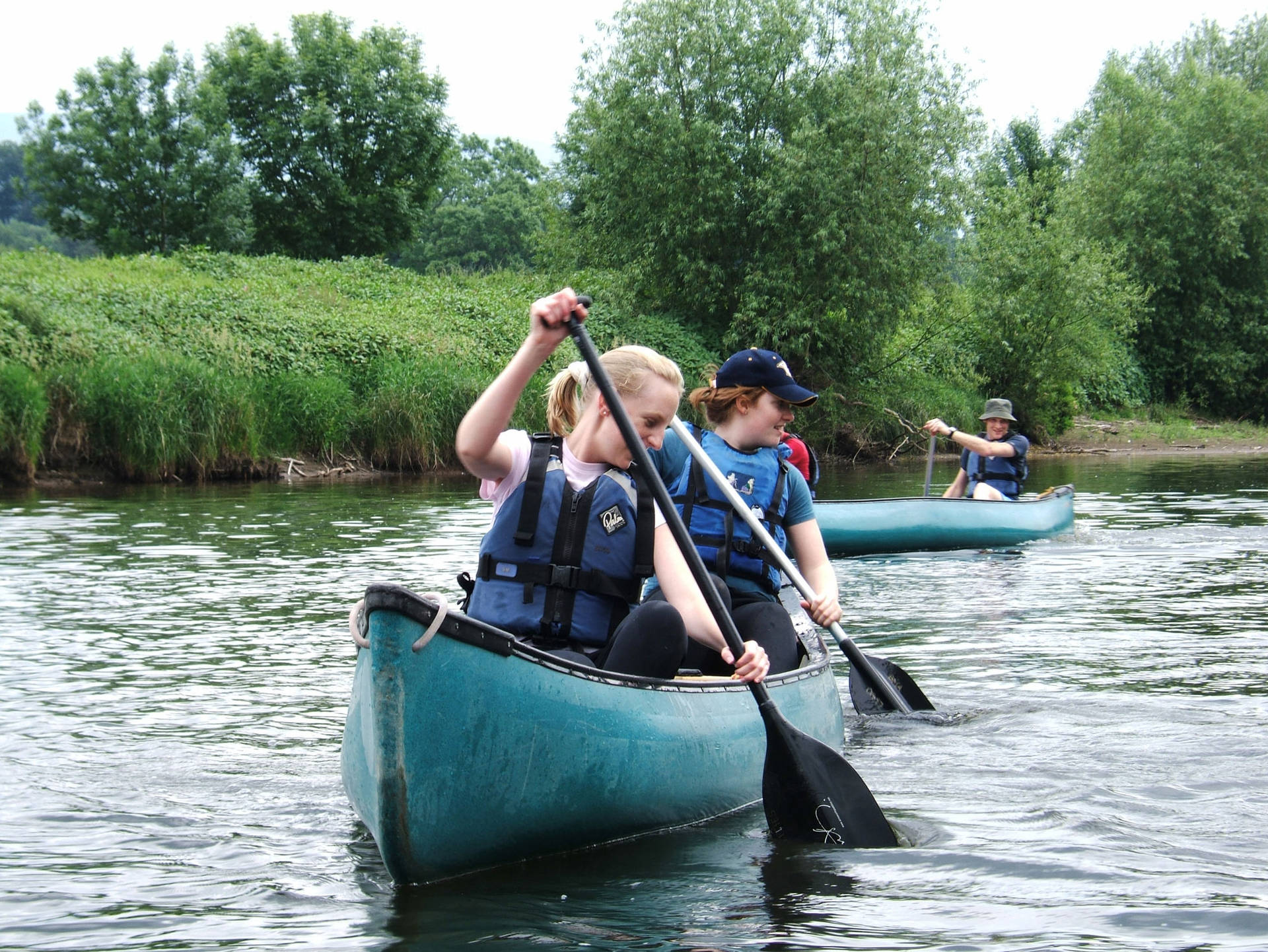 People In Canoeing Boat Background