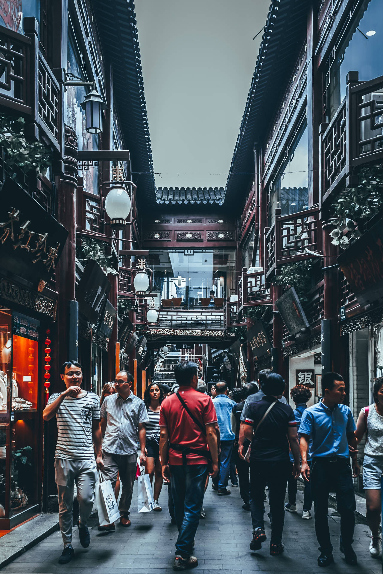 People In Chinese Street Background