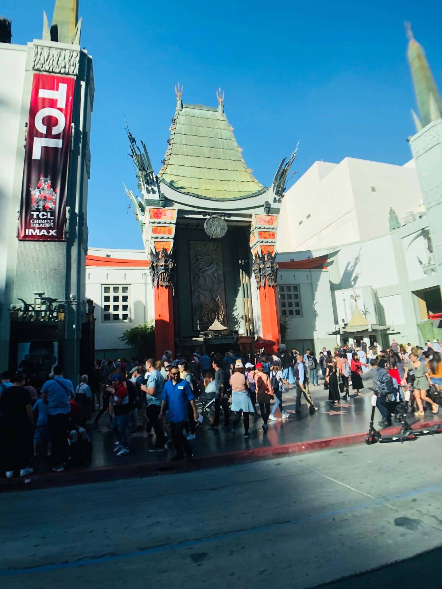 People Lining Outside Graumans Chinese Theatre Background