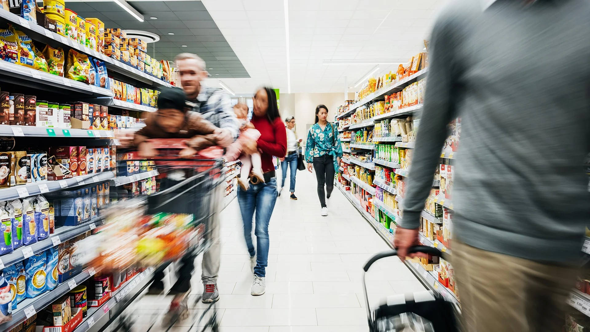 People Rushing In Grocery Store Background