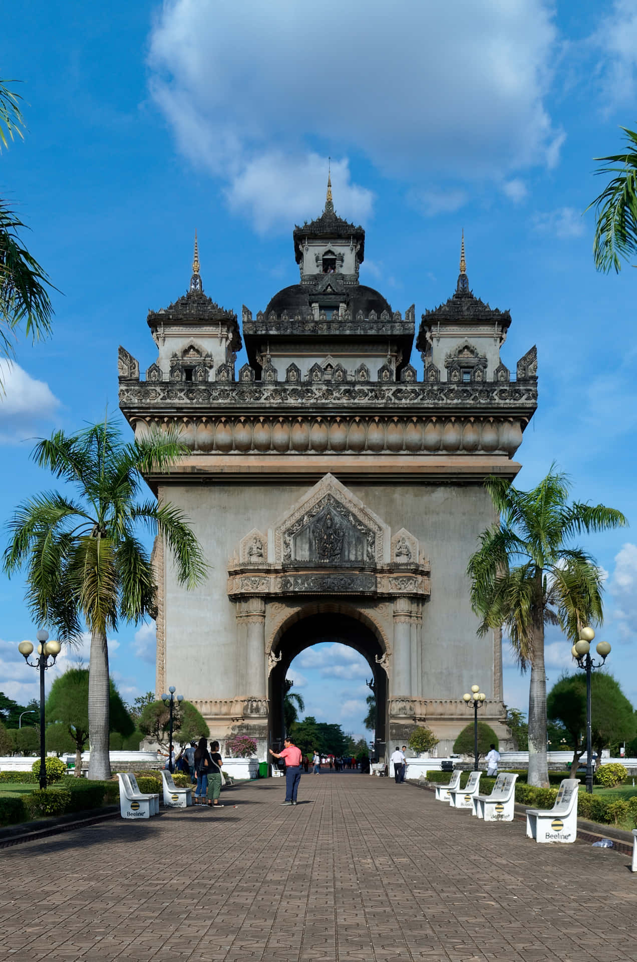 People Visiting Patuxai War Monument Background