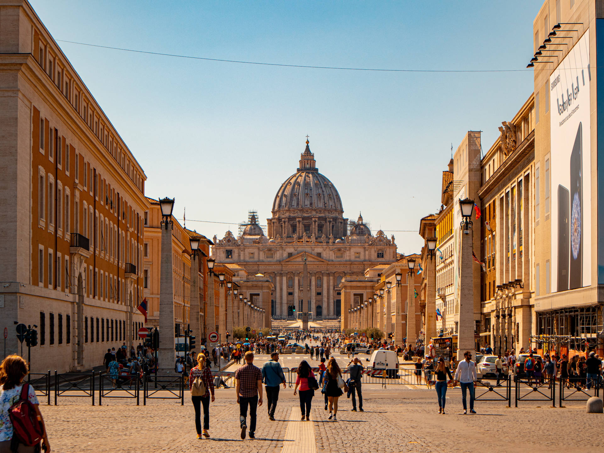 People Walking In Vatican City Background