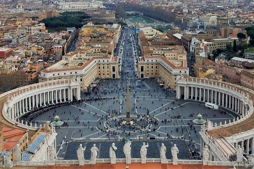 People Walking In Vatican City Background