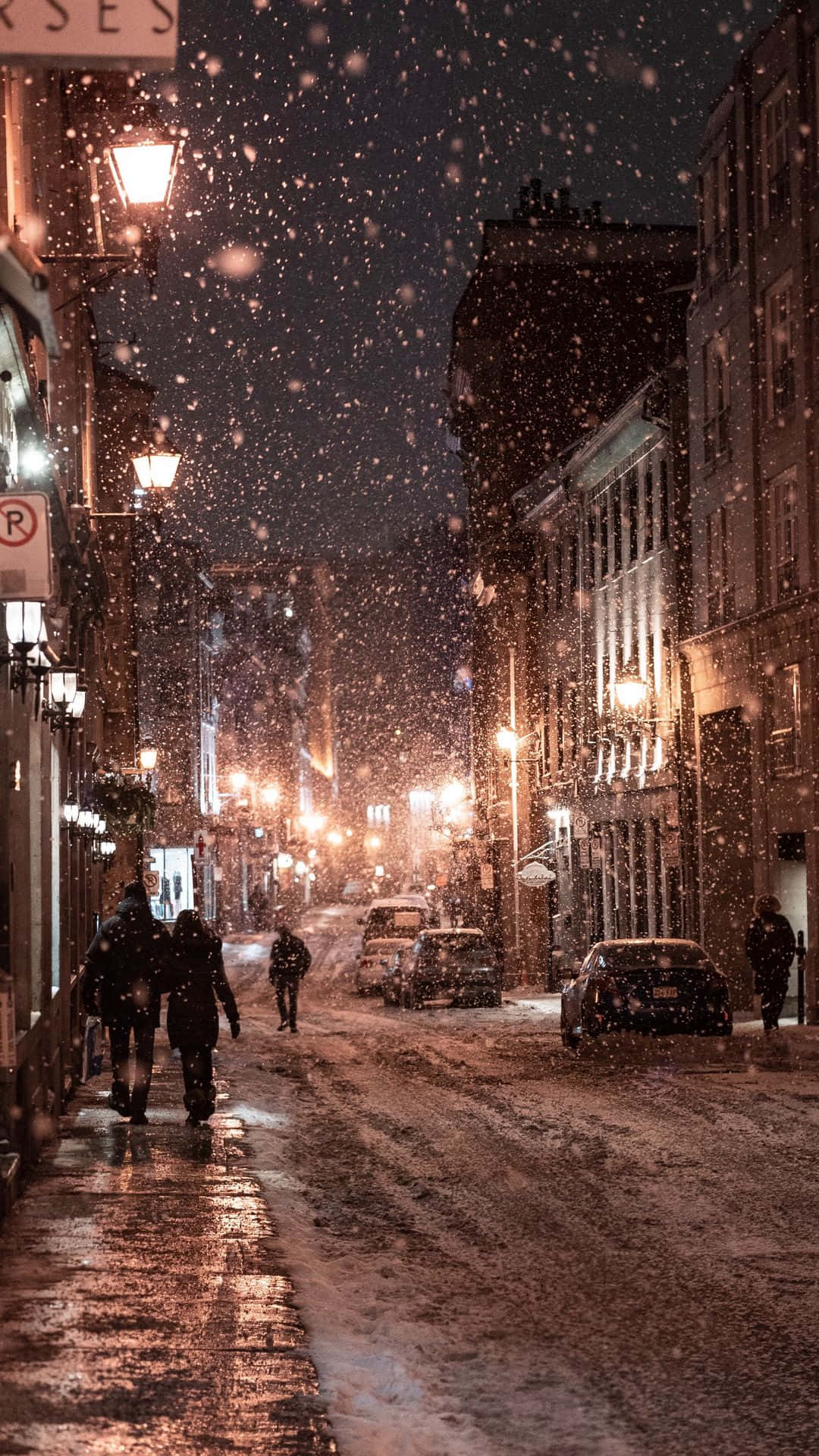 People Walking With Snow Falling Background