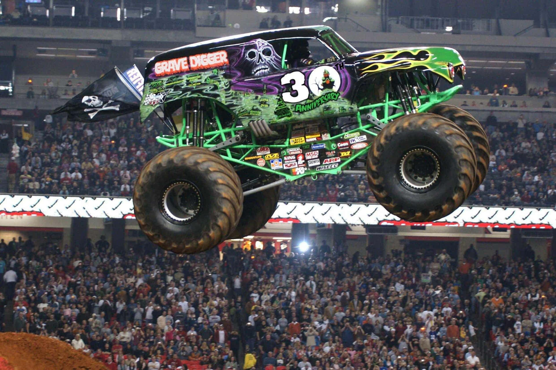 People Watches Monster Truck Grave Digger Background