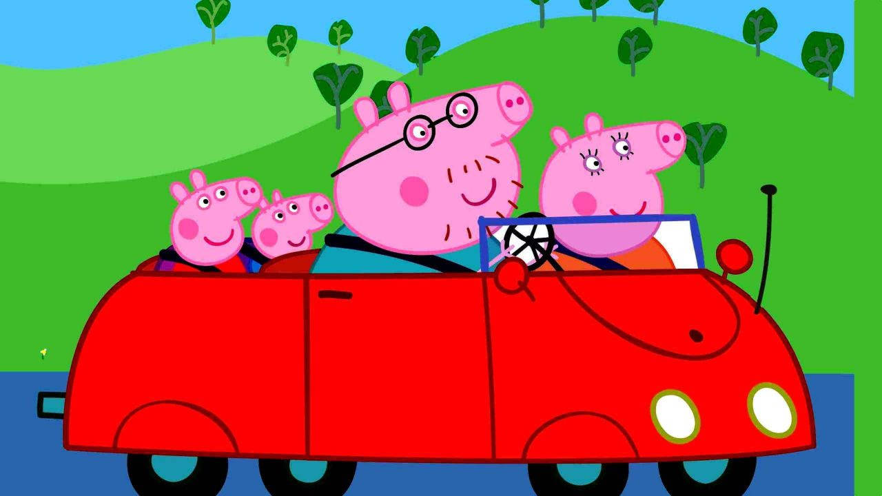 Peppa Pig Family On A Joyous Drive Playing On A Tablet