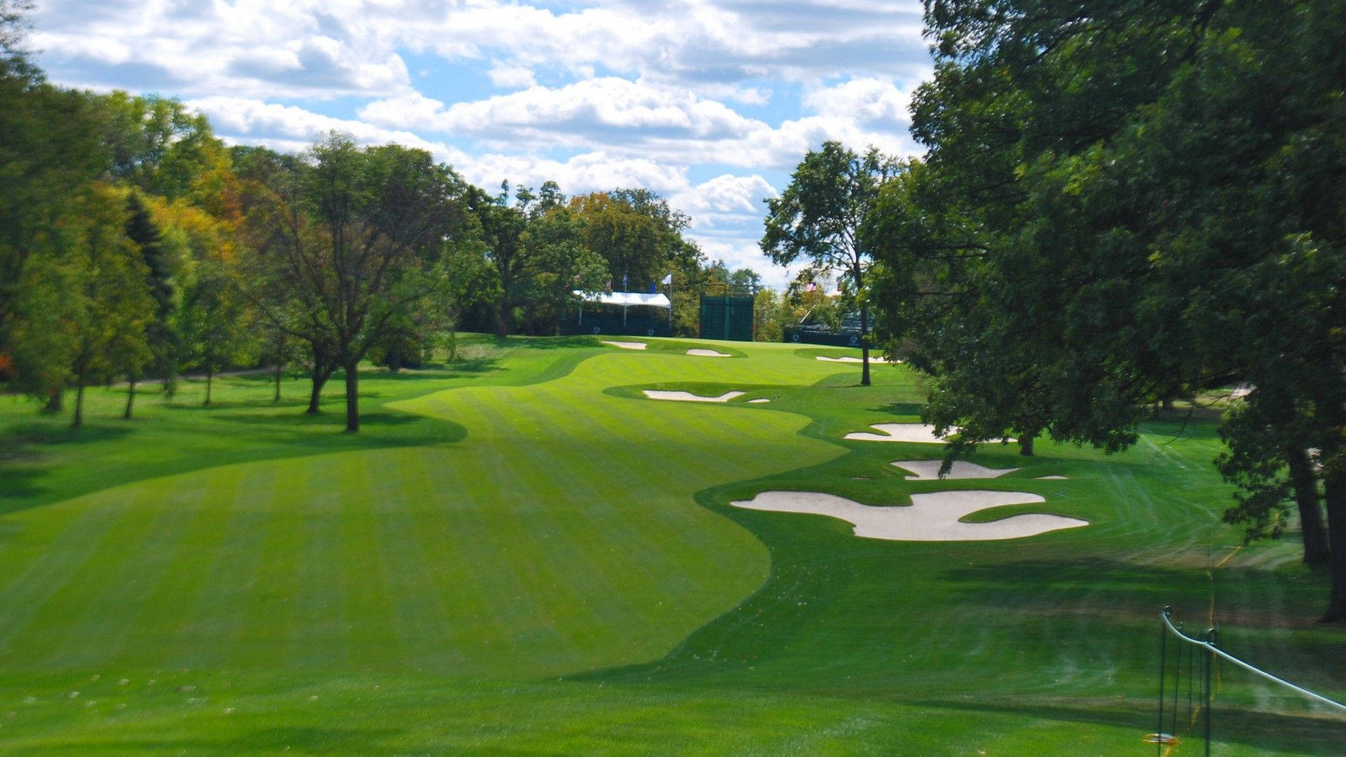 Perfect Golf Day - Enjoying A Round Of Golf On A Beautiful Day Background