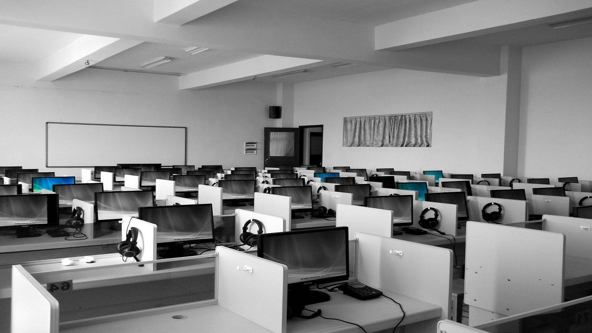 Perfectly Arranged White Office Desks Background