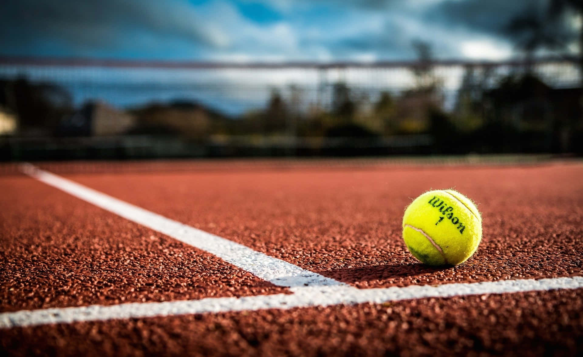 Perfectly Crafted Tennis Ball To Enhance Your Sports Experience. Background