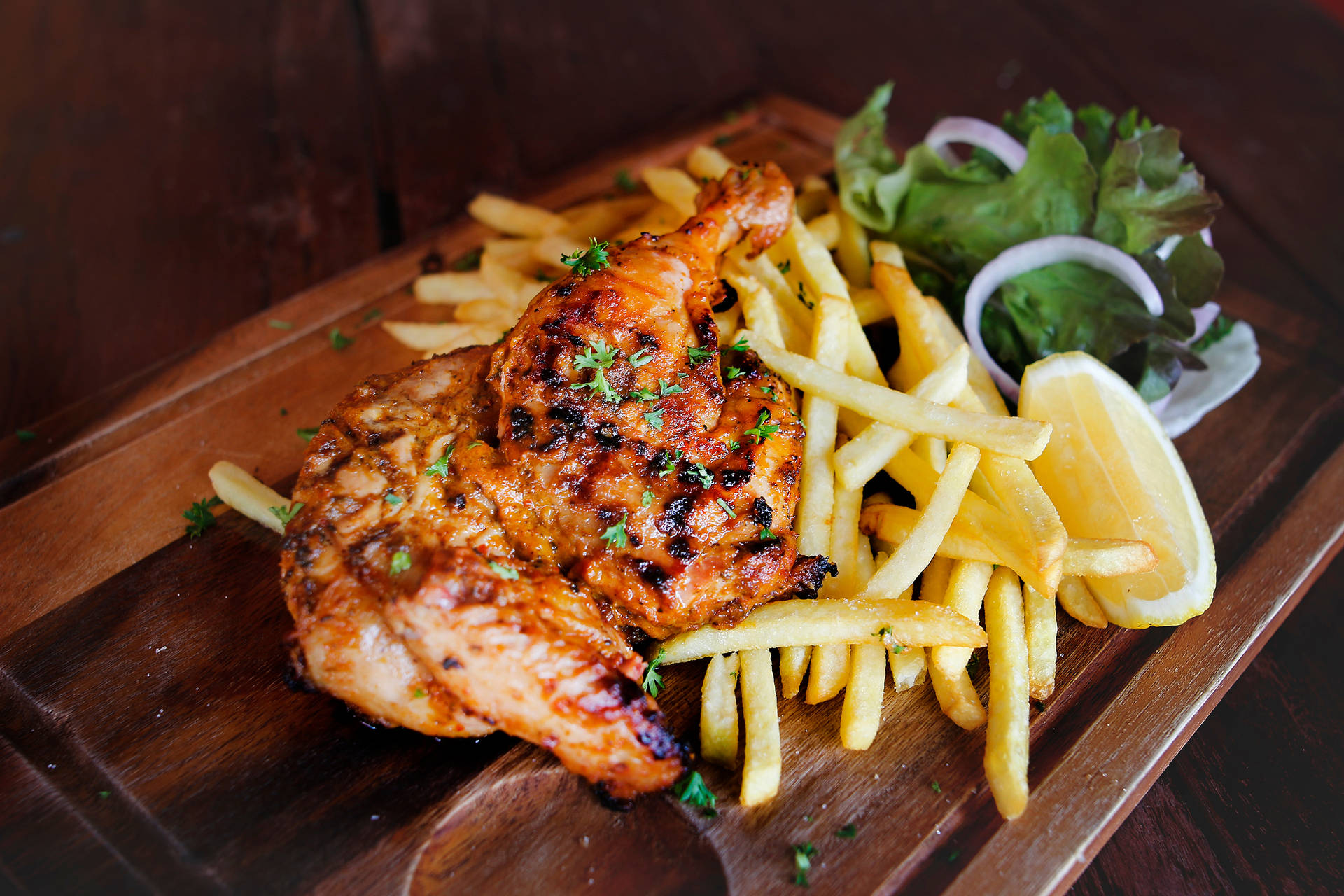 Peri Peri Chicken With Fries Topped With Parsley Background