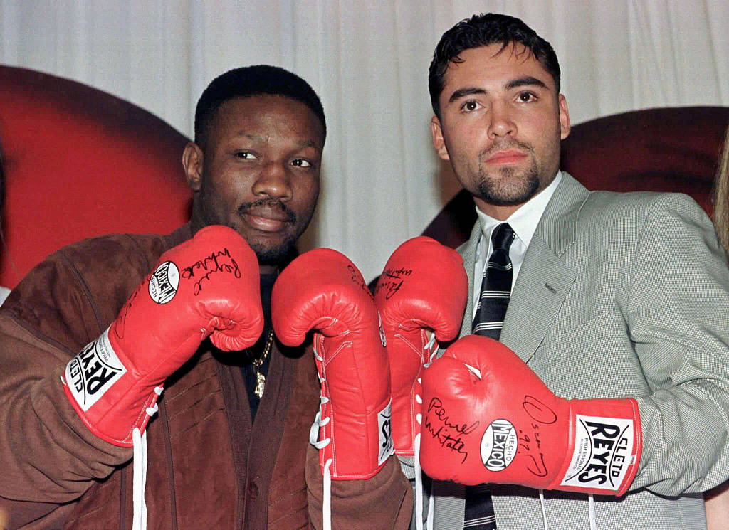 Pernell Whitaker Posing With Opponent Background