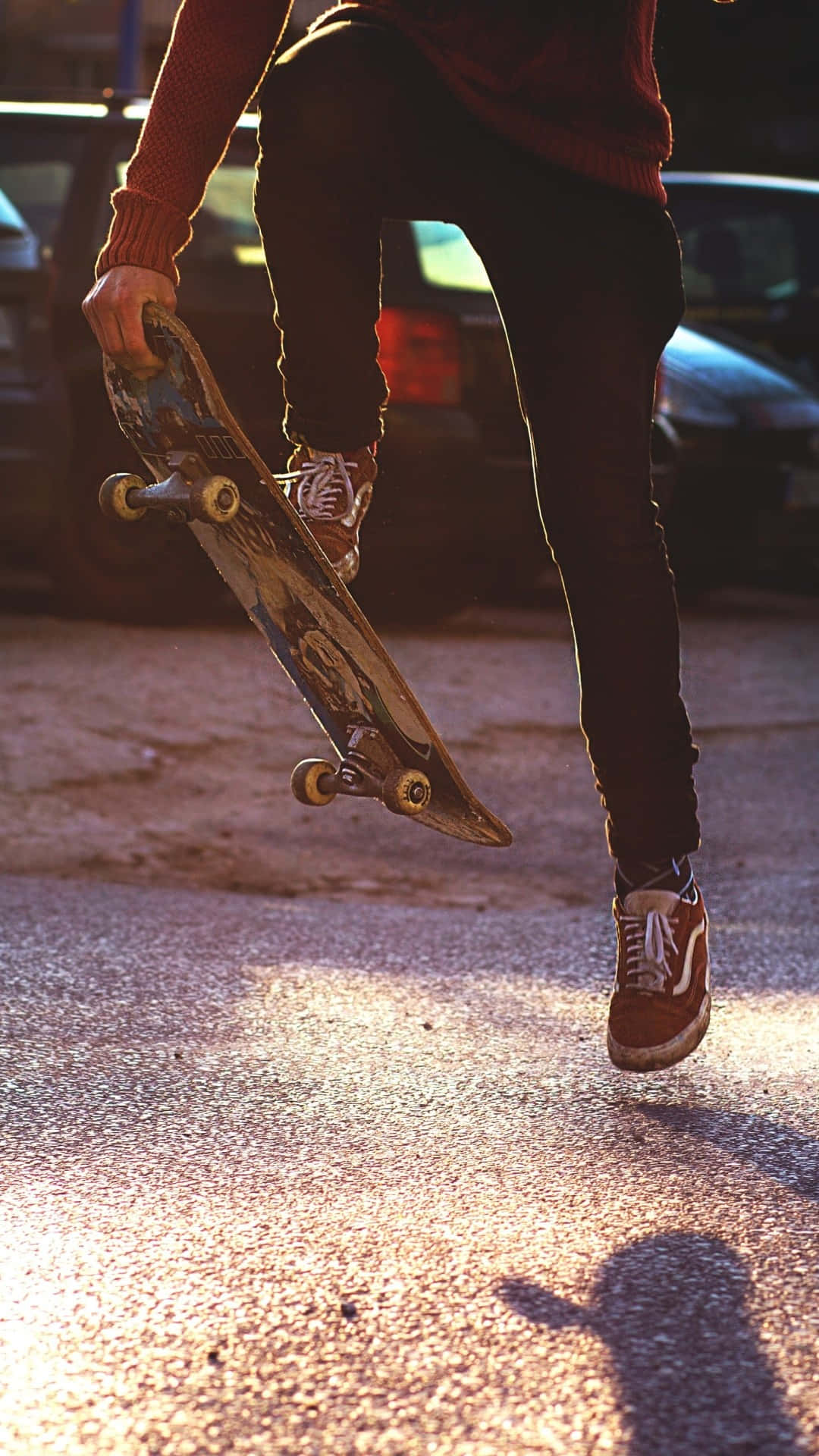 Person Doing Tricks Retro Skateboard Background