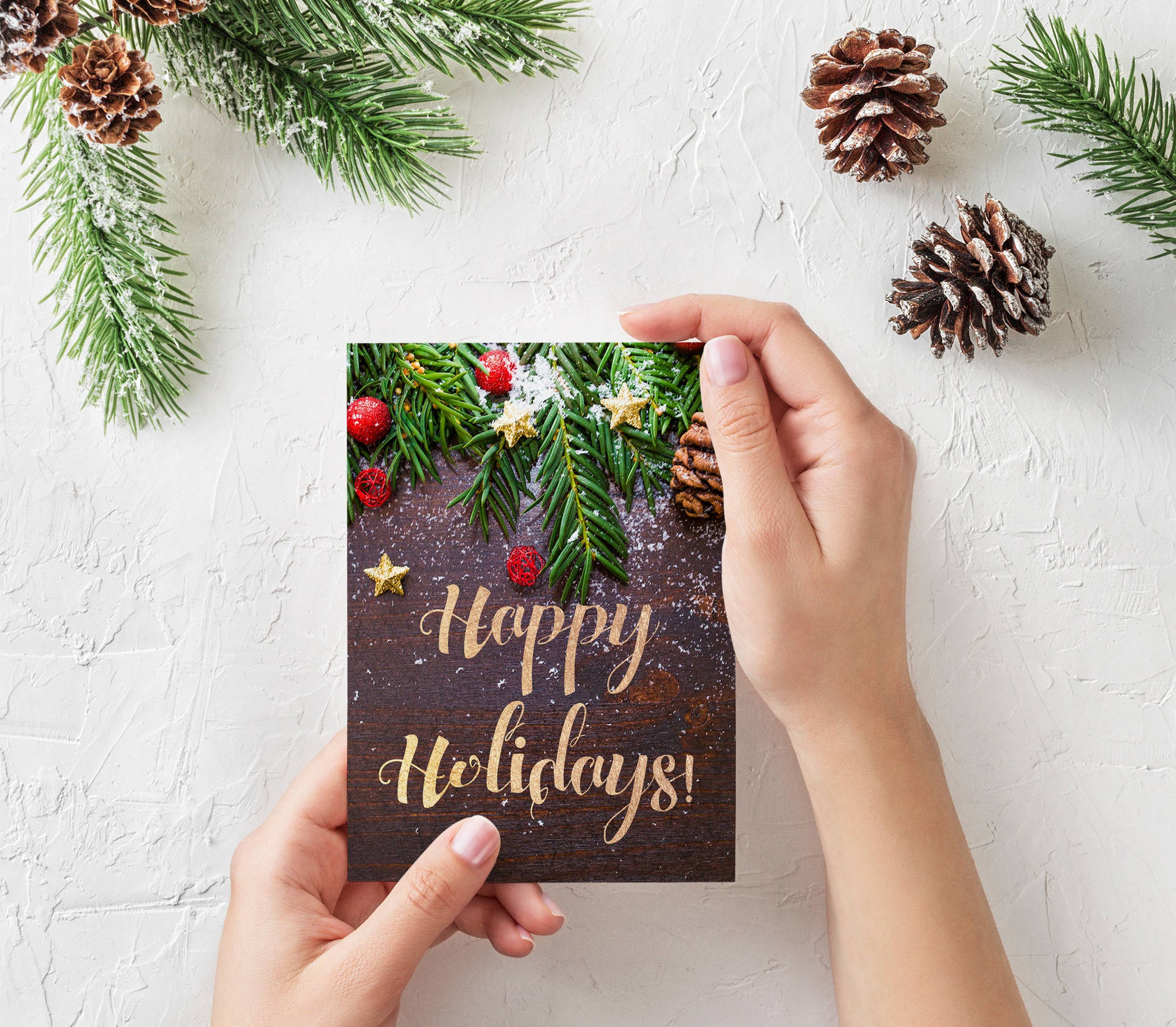 Person Holding Holiday Card Background