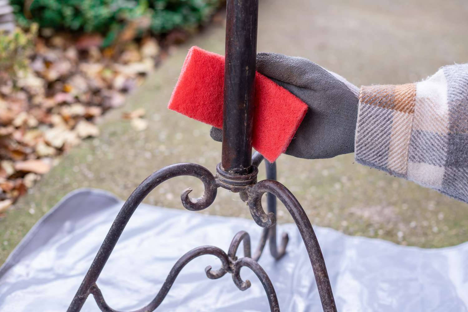 Person Restoring Metal Iron Fixtures Background