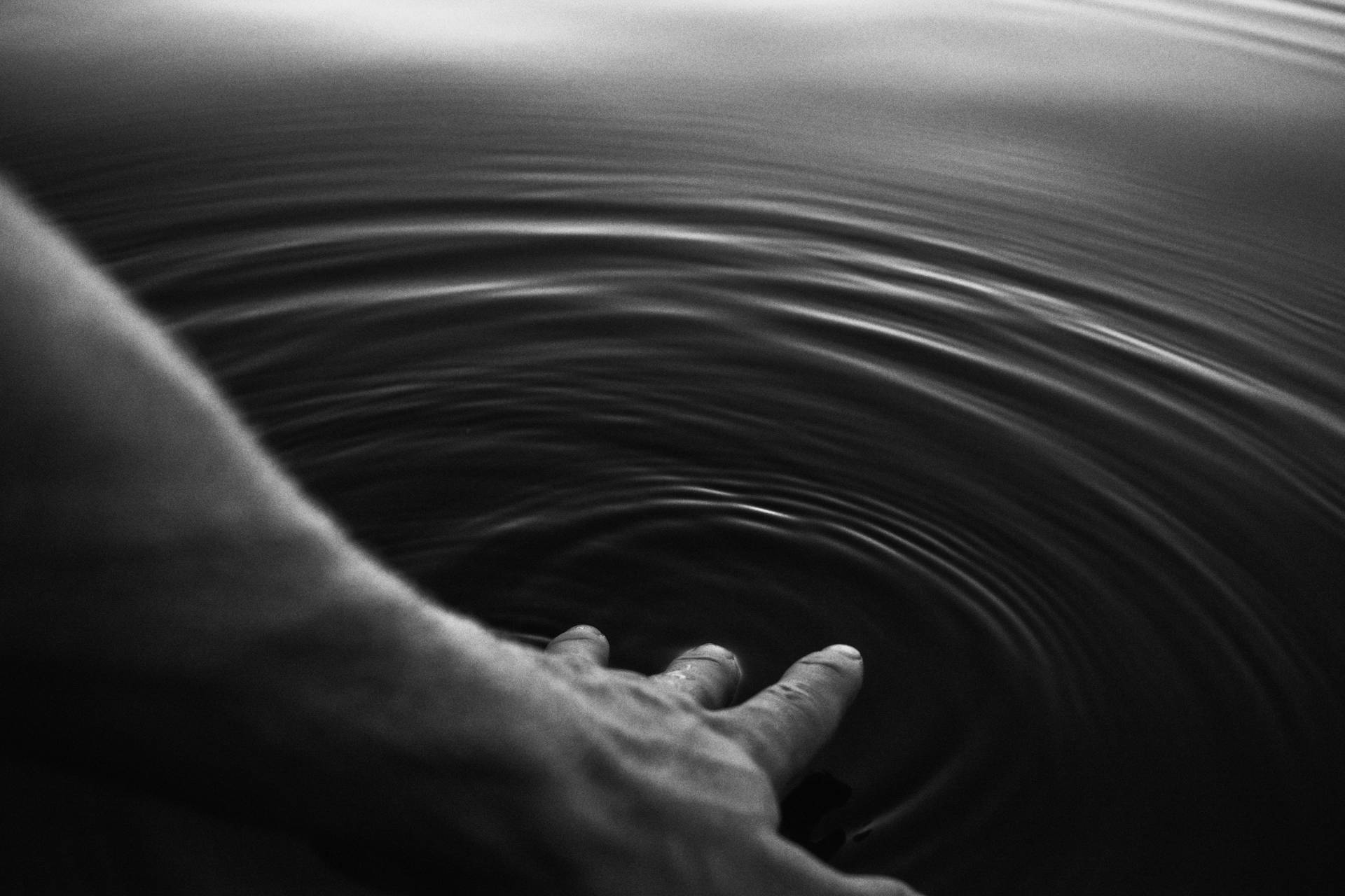 Person Touching Water Black Screen 4k Background