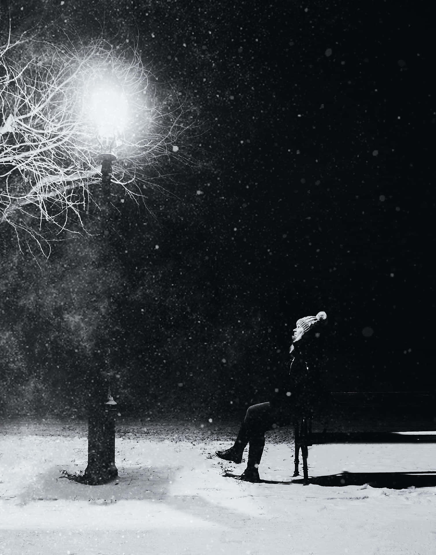 Person Waiting Beside The Street Light