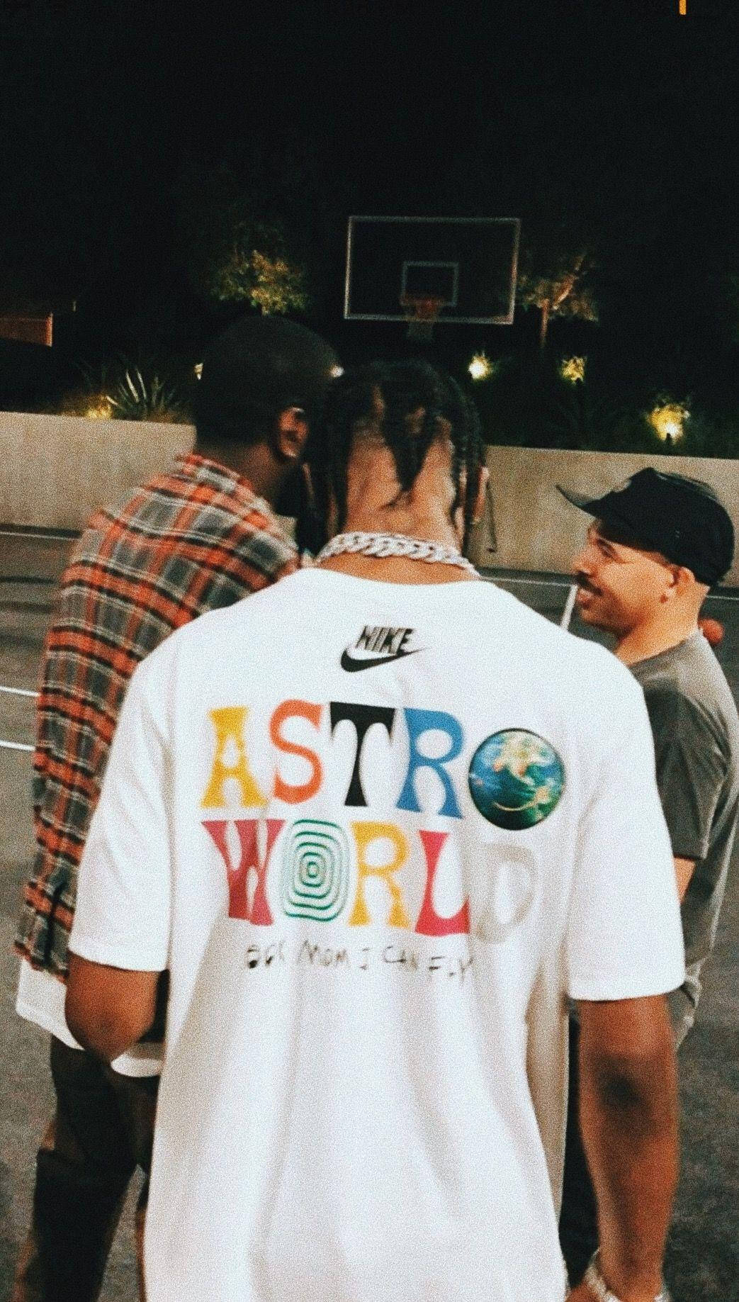 Person Wearing Travis Scott Astroworld T-shirt Background
