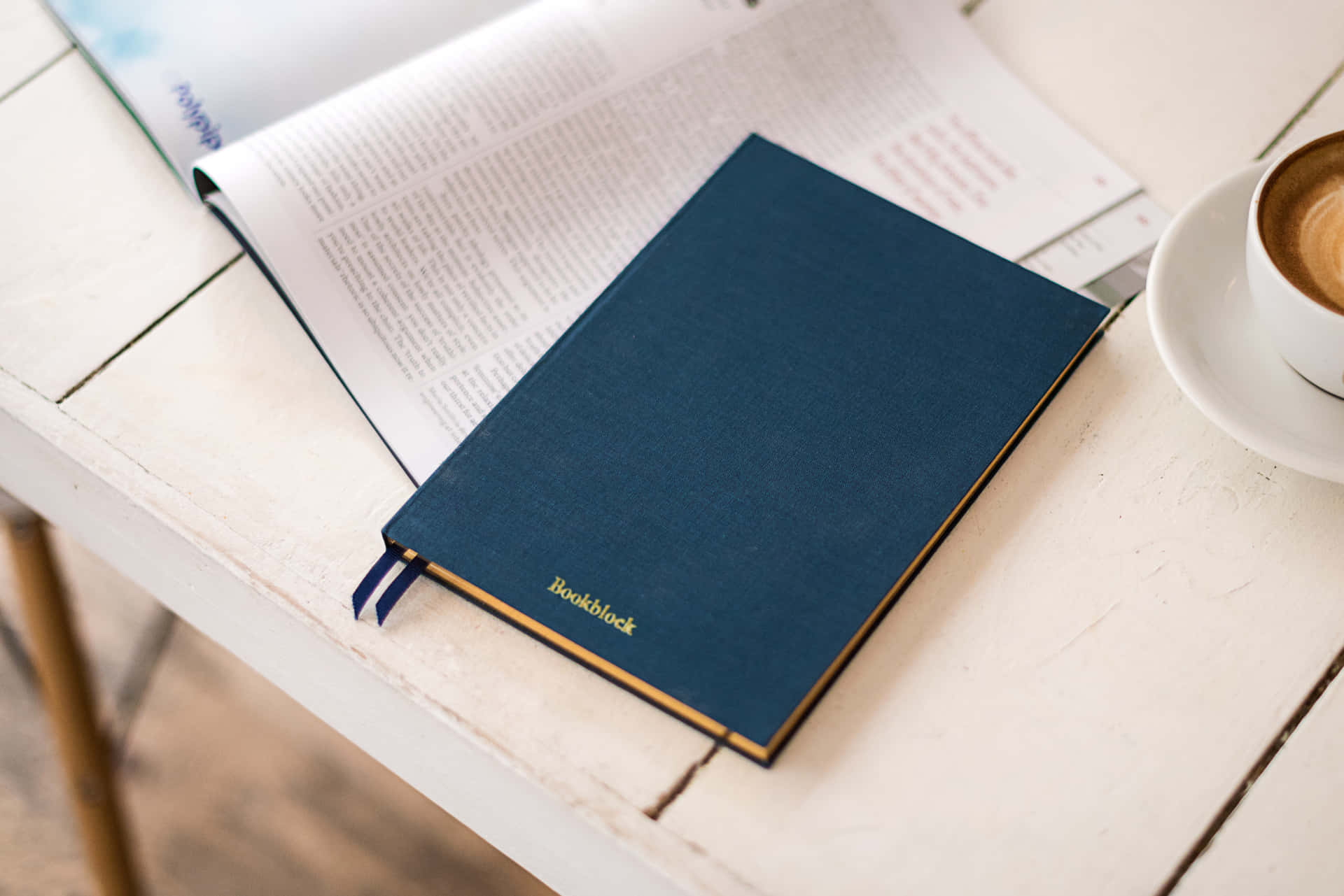 Personal Planner On A Desk With Essentials Background