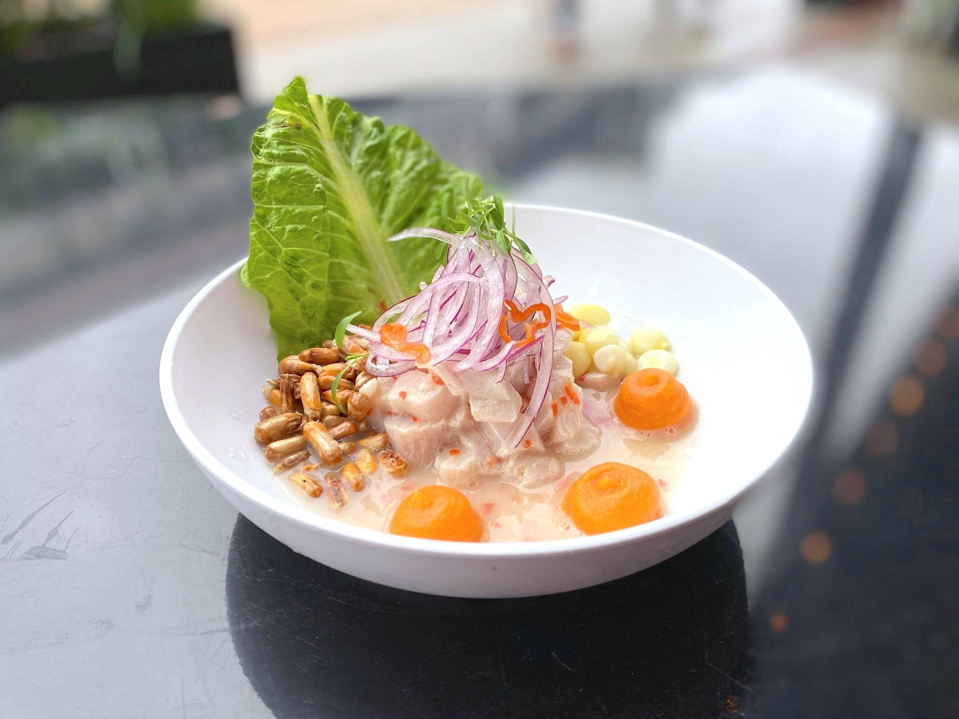 Peruvian Ceviche Garnished With Corn Nuts Background