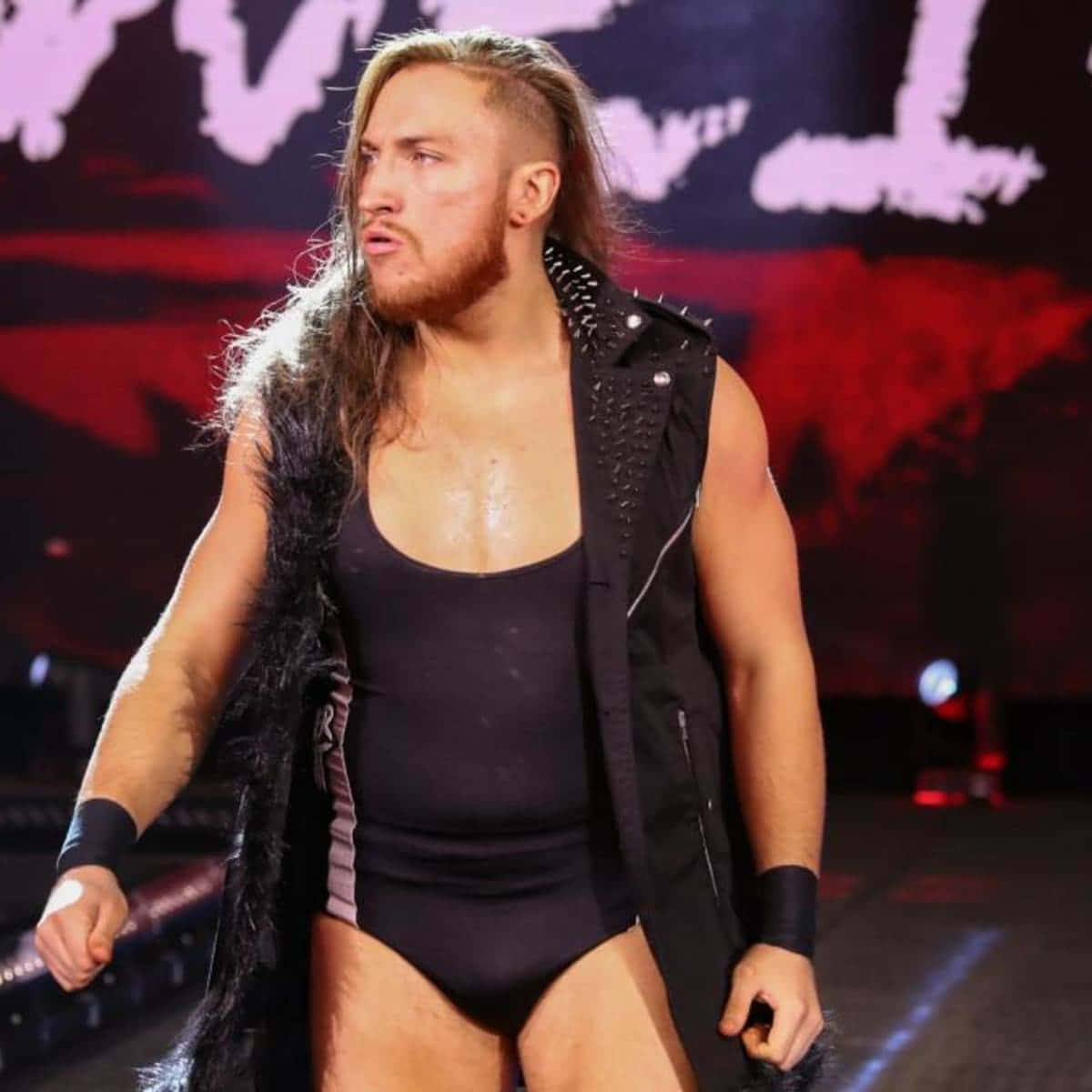 Pete Dunne With His Trademark Grimace Making A Dynamic Entrance Background