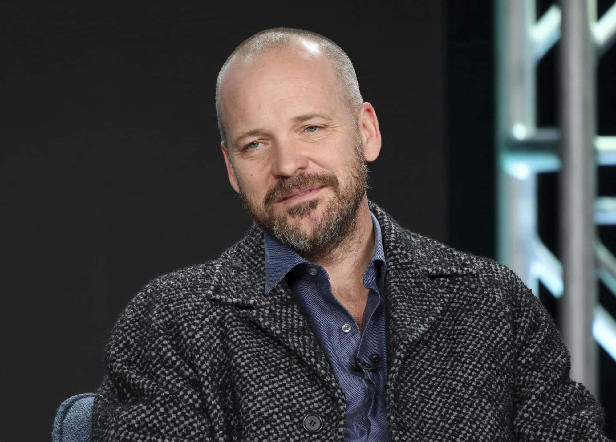 Peter Sarsgaard Looks Determined And Confident; Background