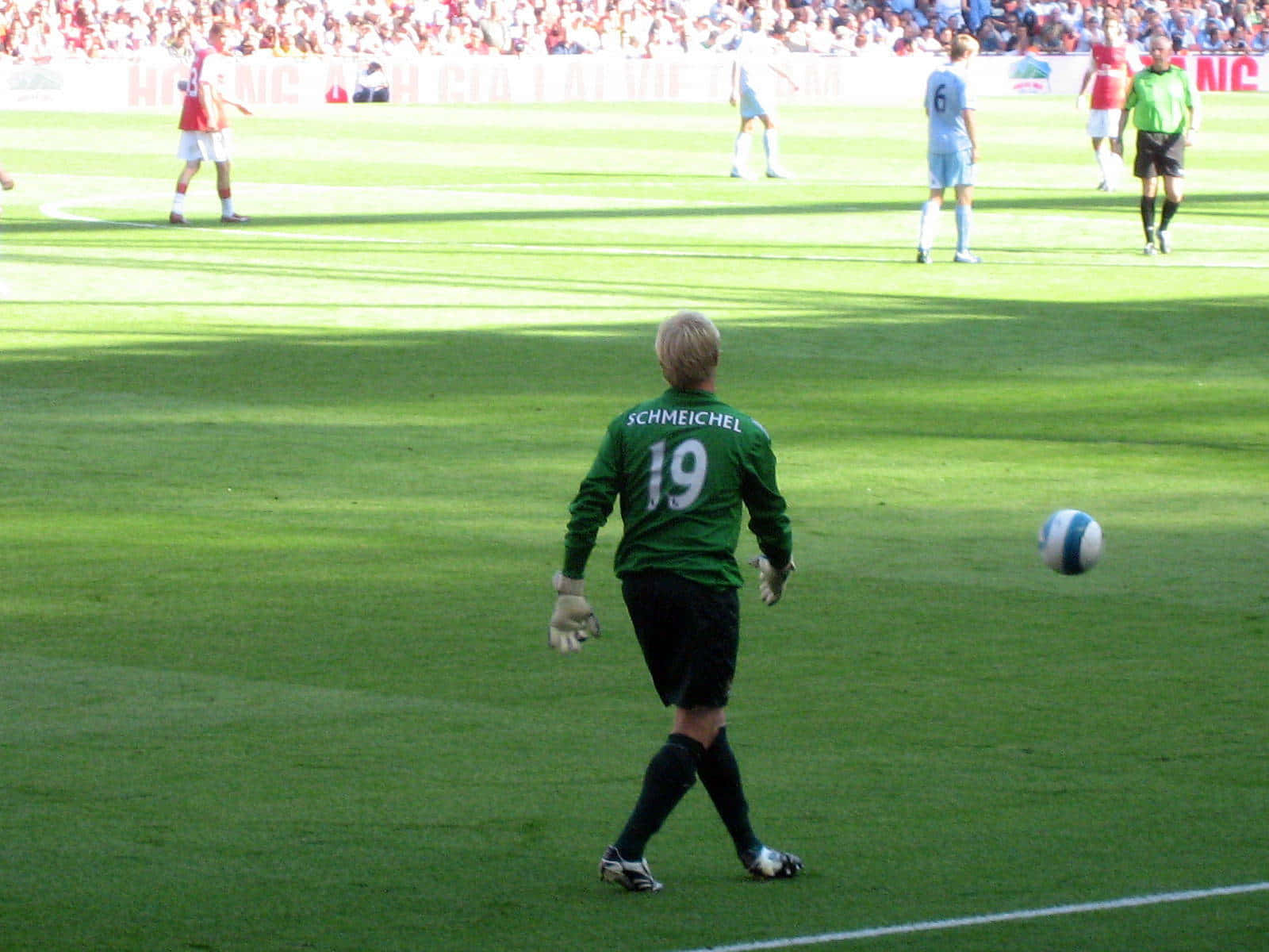 Peter Schmeichel Goalkeeper In A Match Background