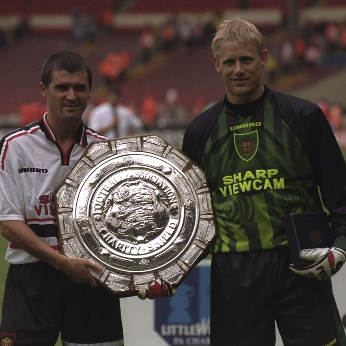 Peter Schmeichel With Roy Keane Background