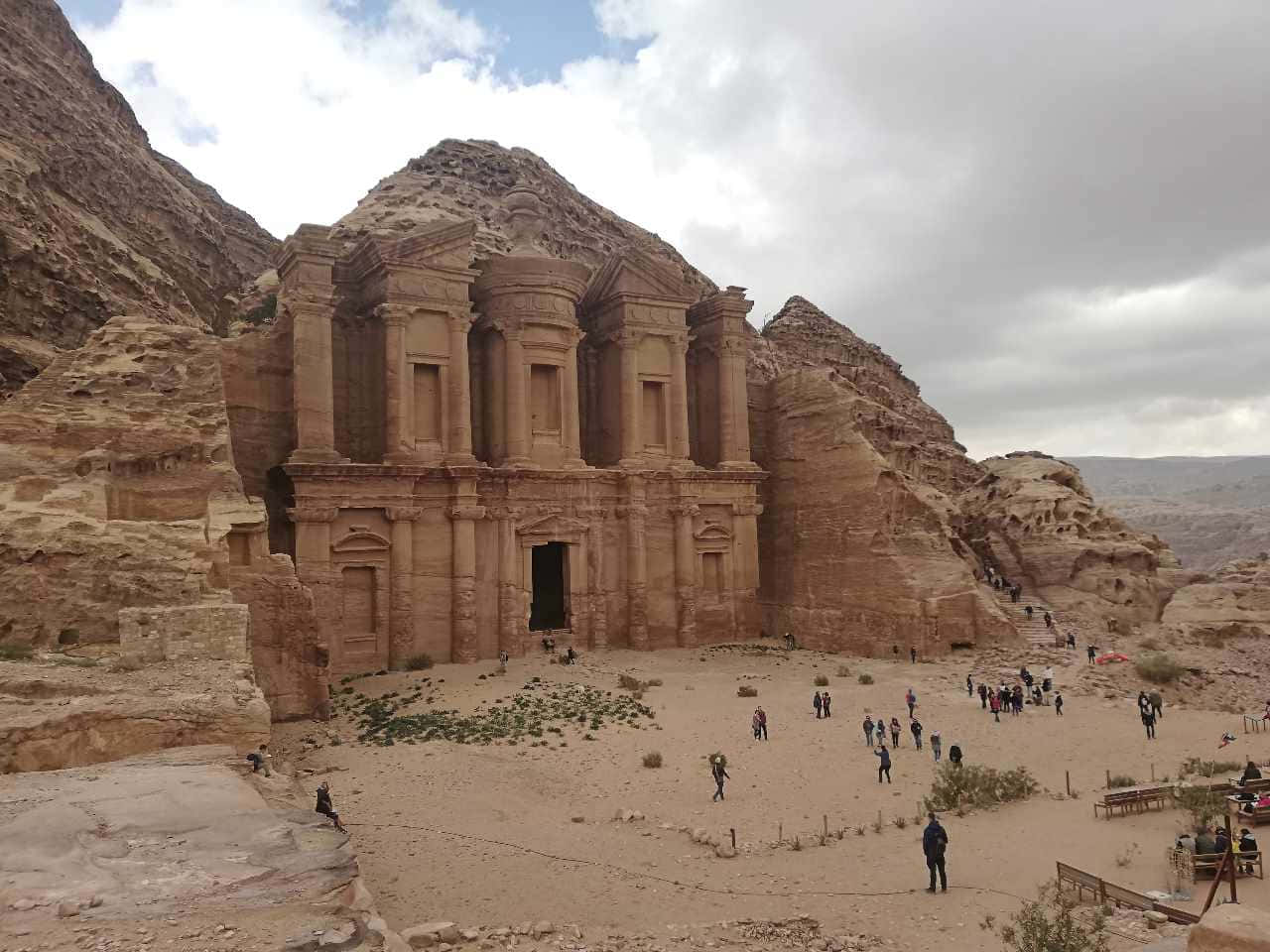 Petra Against Cloudy Blue Skies Background