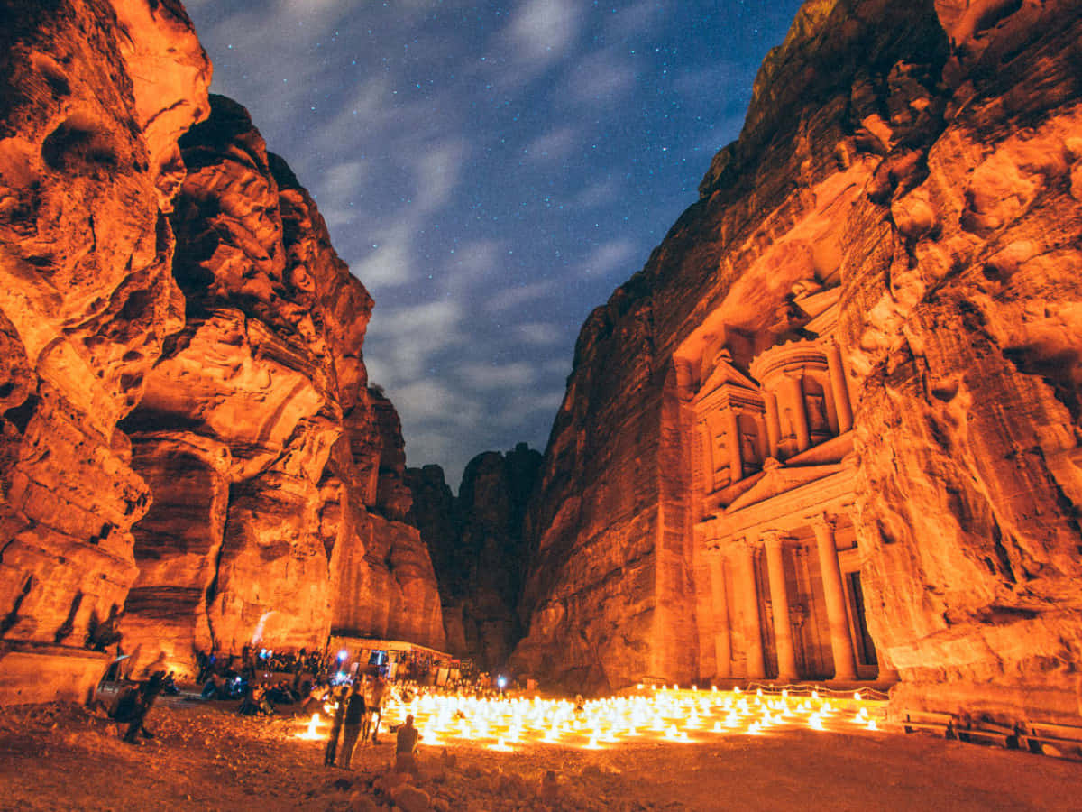 Petra City Under Night Sky Background