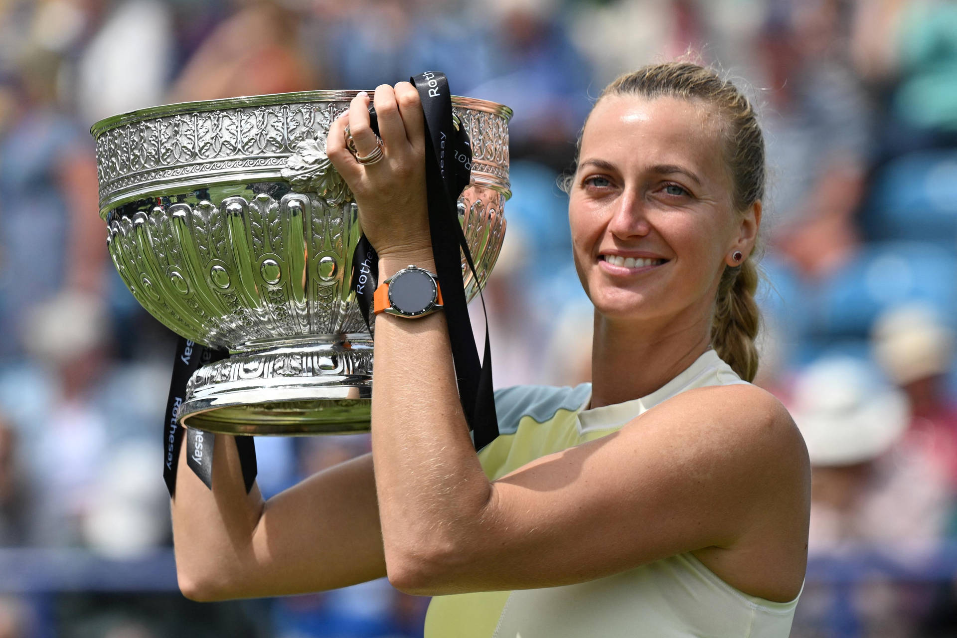 Petra Kvitova Holding Huge Trophy Background