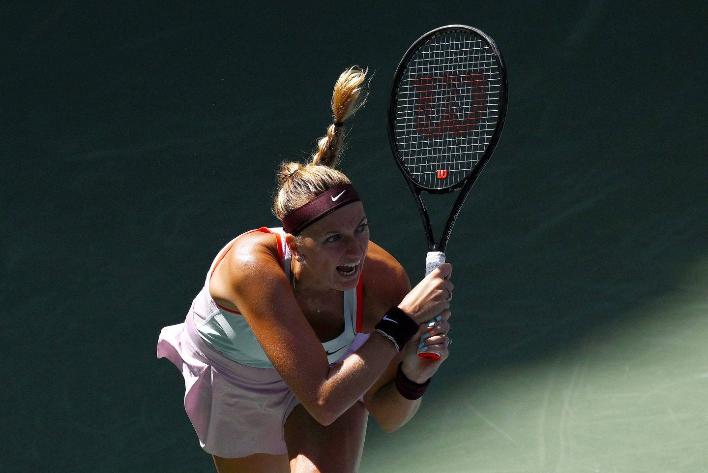 Petra Kvitova In Action - Dominating The Tennis Court Background