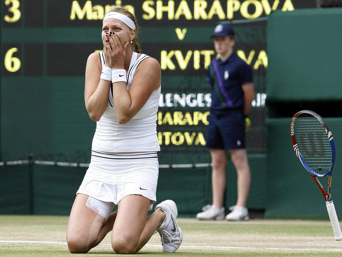 Petra Kvitova Shocked And Kneeling Background