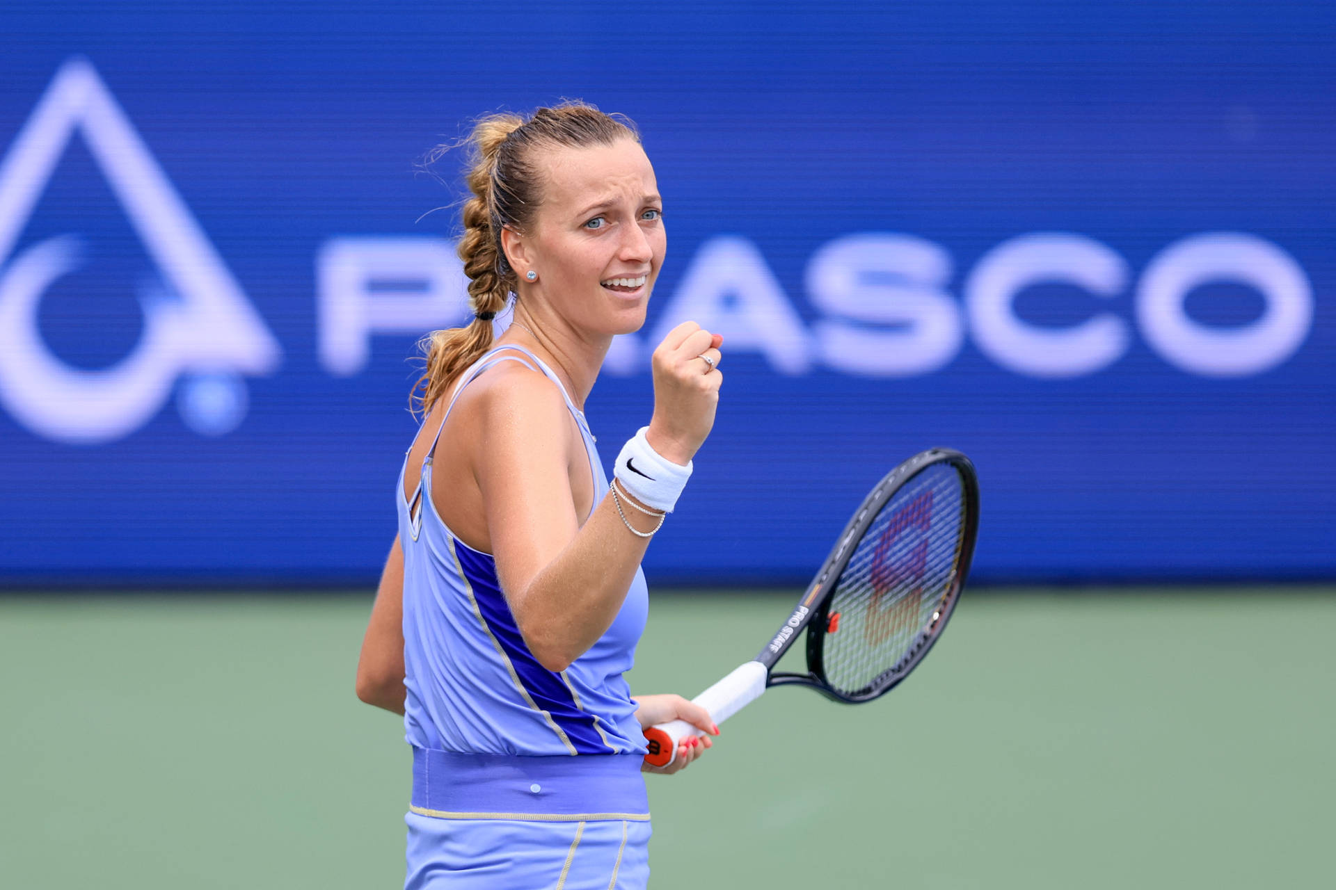 Petra Kvitova Smiling Fist Pump Background