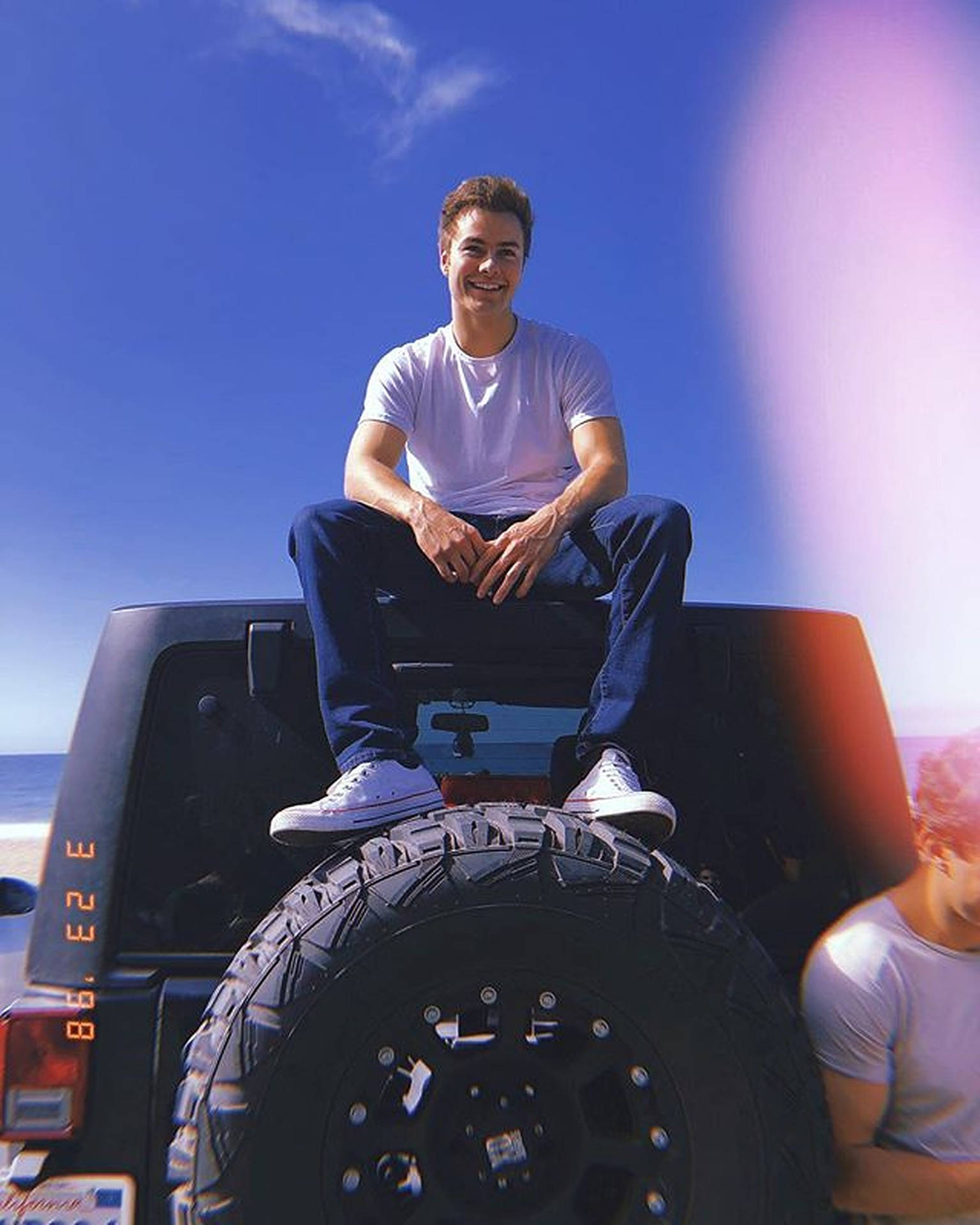 Peyton Meyer Top Of Car Background