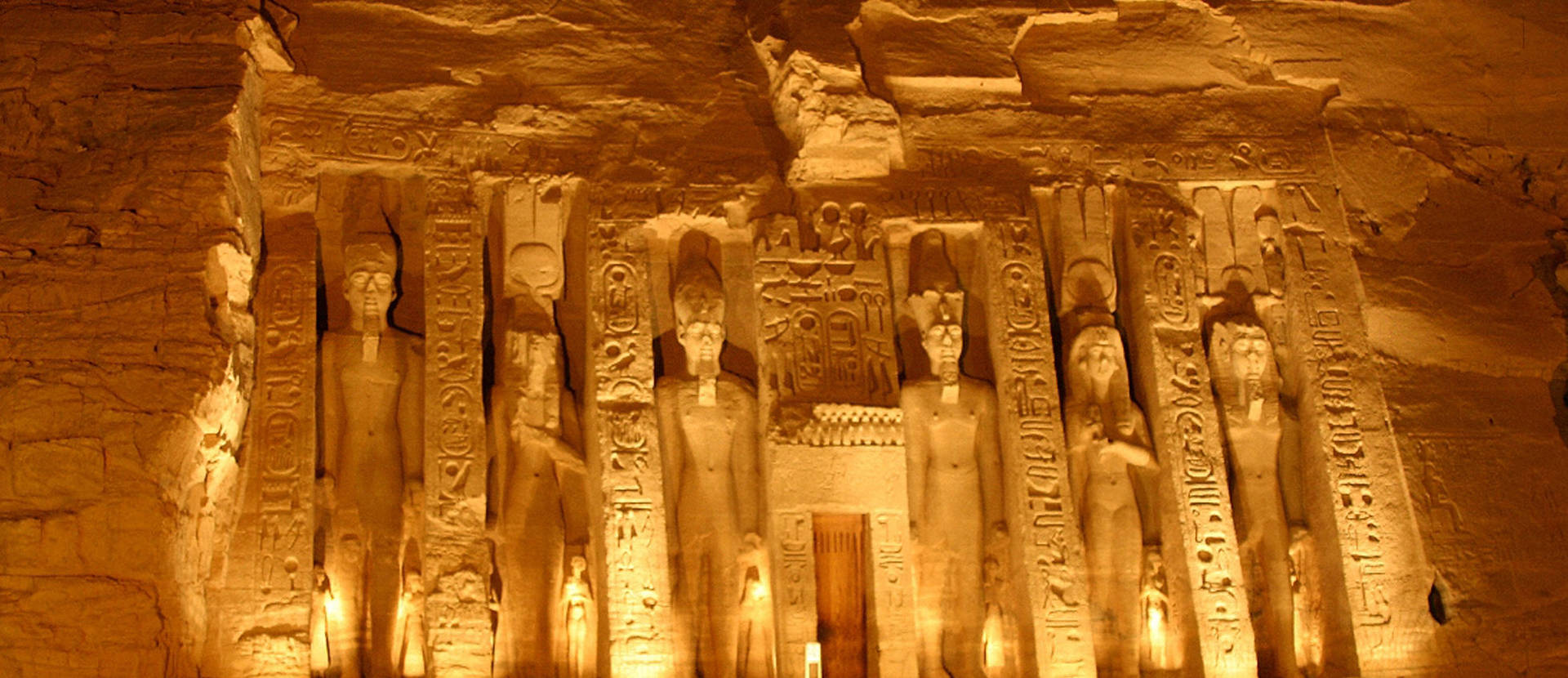 Pharaohs Inside The Temples Of Abu Simbel Background