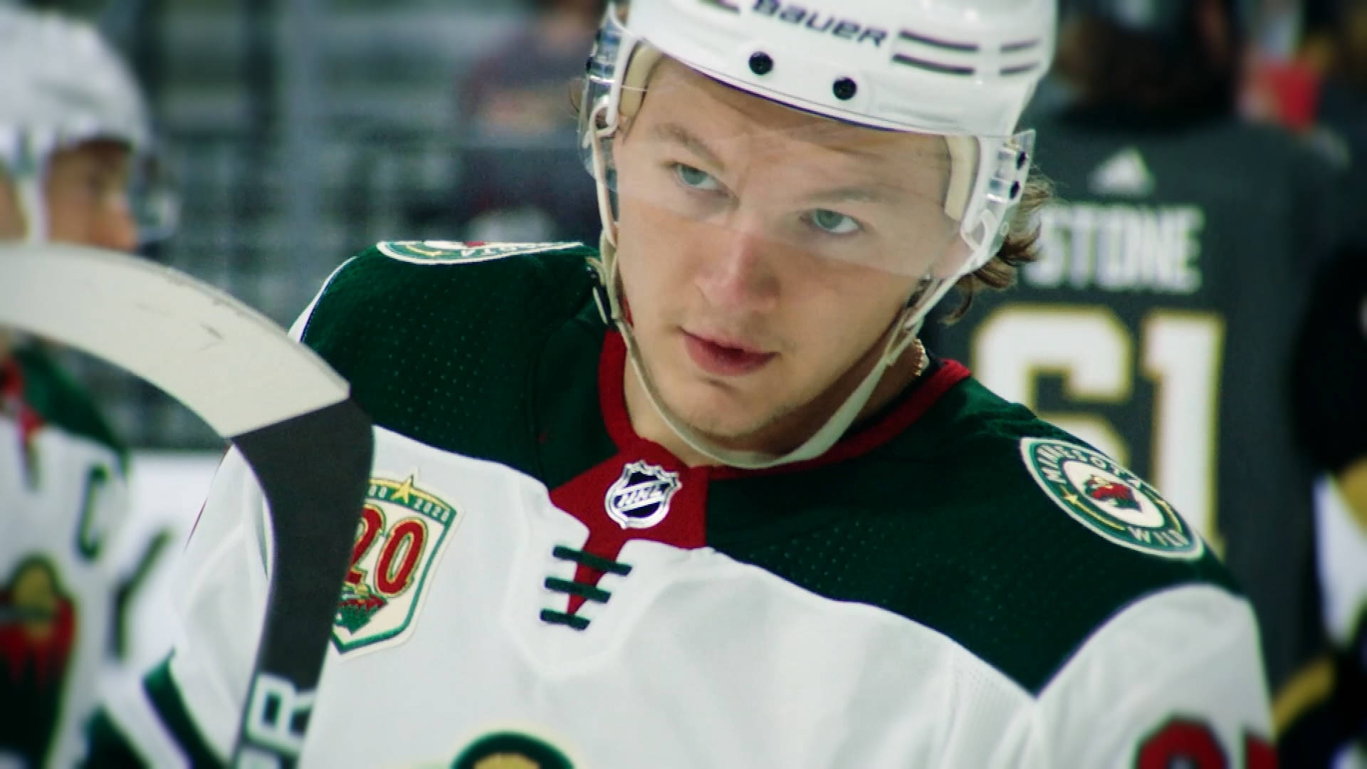 Phenomenal Ice Hockey Forward Kirill Kaprizov In Action Background