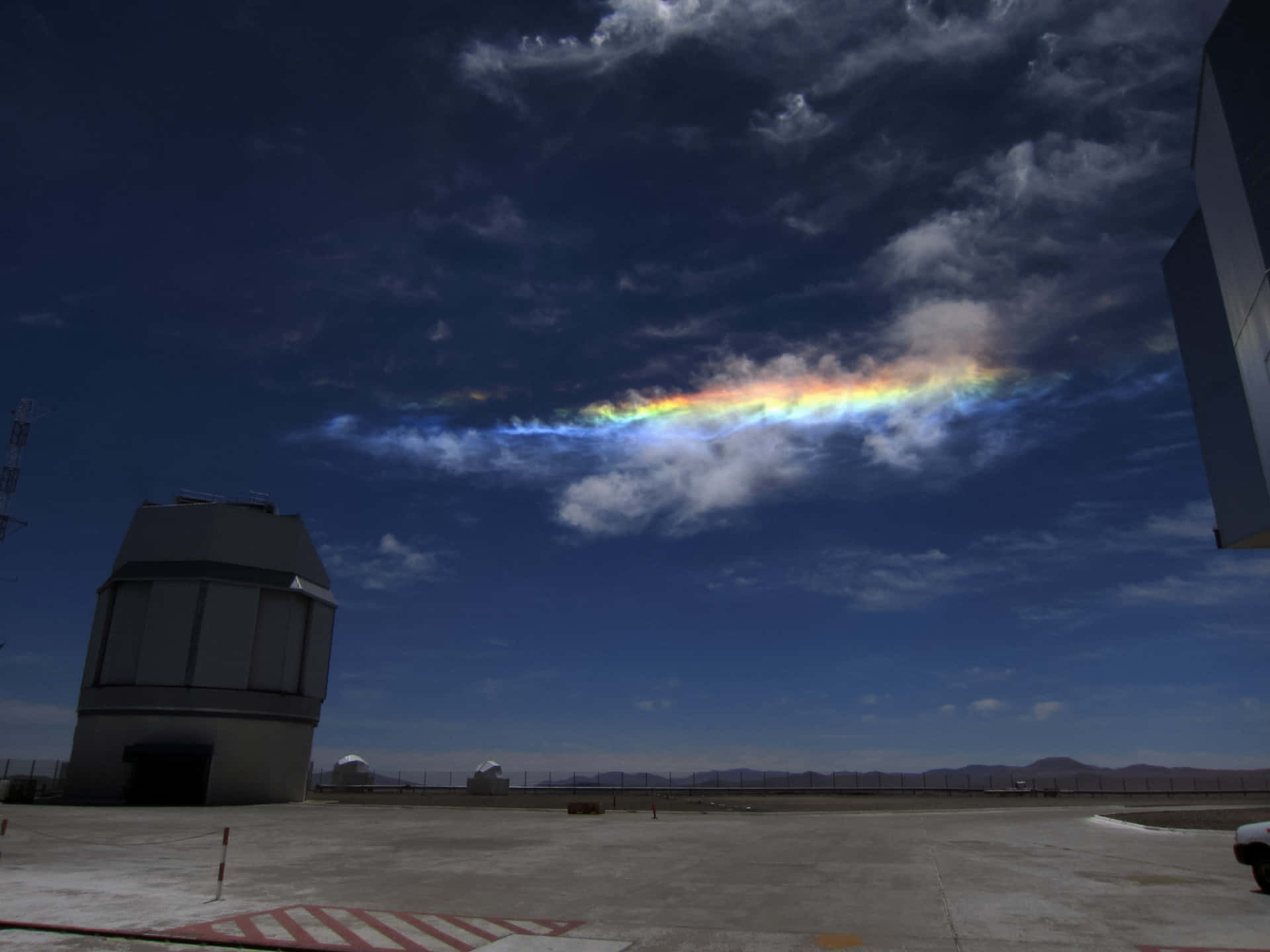 Phenomenal Rainbow Among The Clouds Background