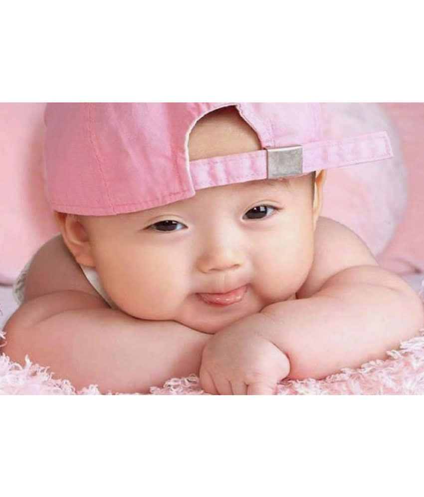 Phenomenal Smile Of A Baby Background