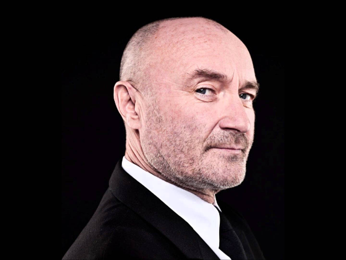 Phil Collins In Black Tuxedo Background