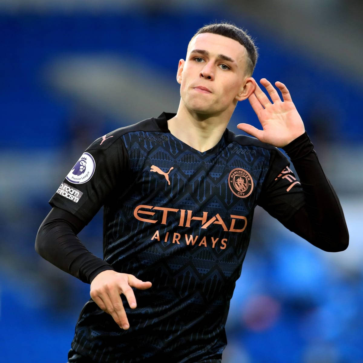 Phil Foden In Black Jersey Background