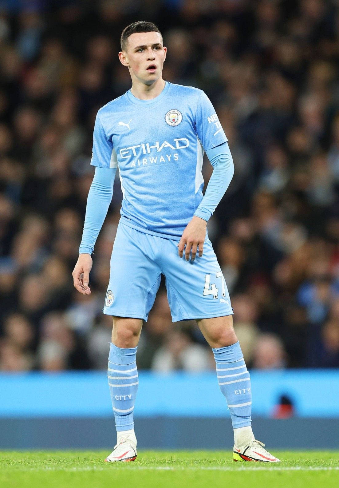 Phil Foden In Field Action Background