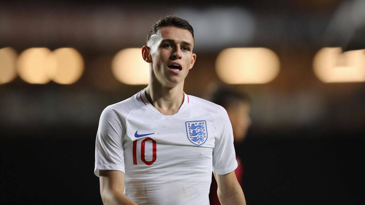 Phil Foden In White Jersey Background